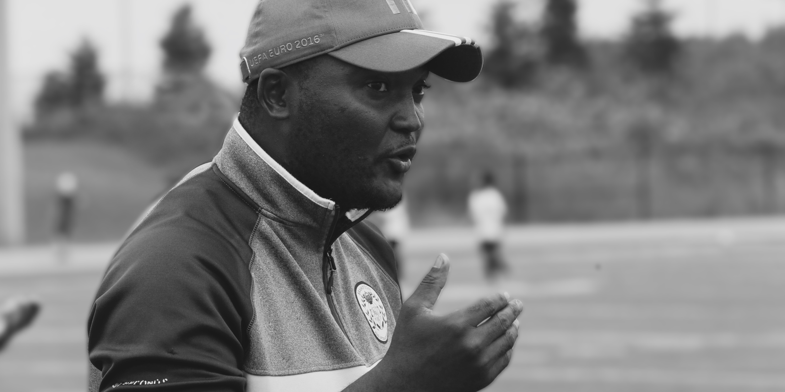 Image of a coach talking